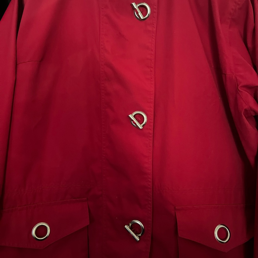 Red coat/jacket.Silver coloured adornments. Water repellent. Lined. Nautical - Picture 7 of 12